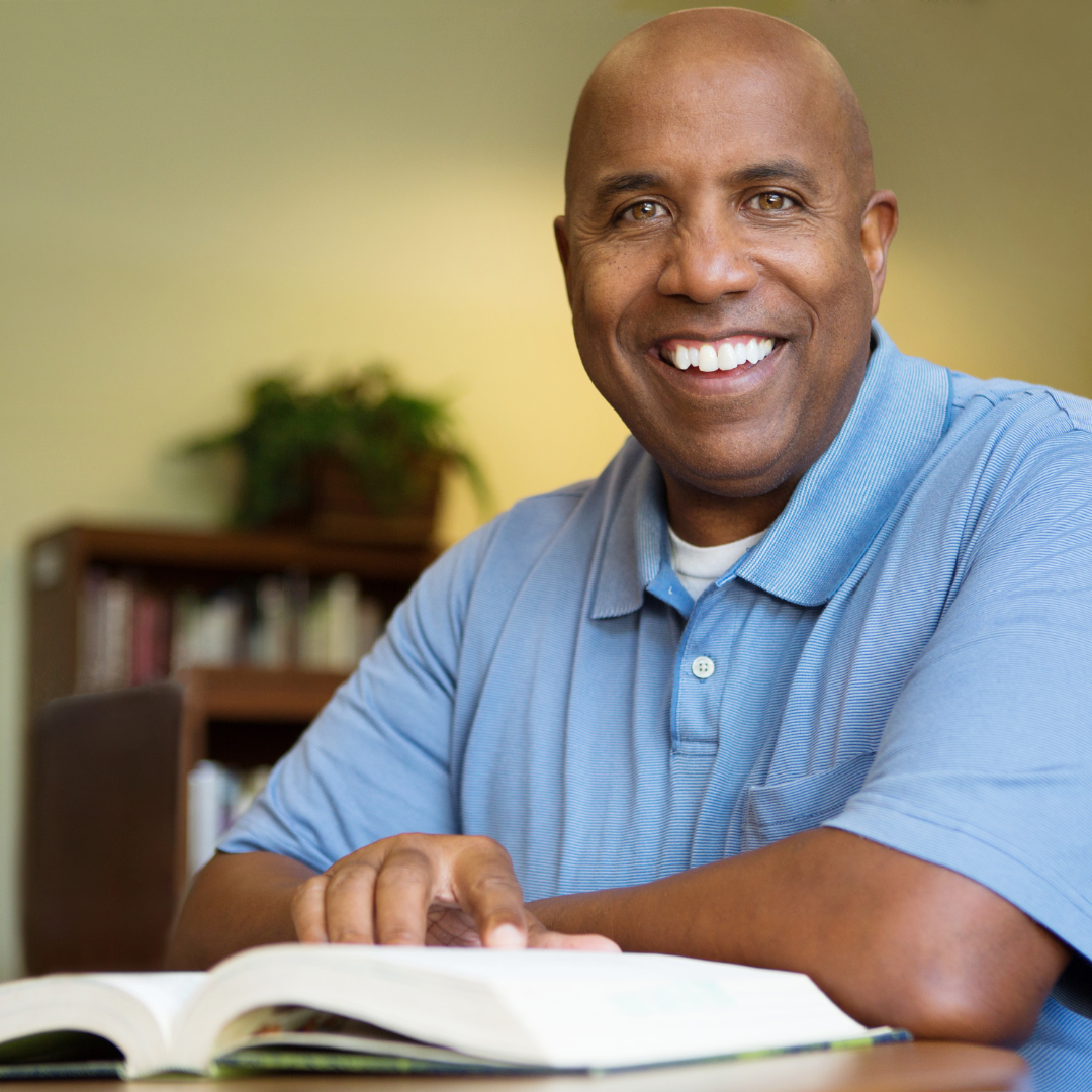 Smiling adult patient with braces at Classic City Orthodontics